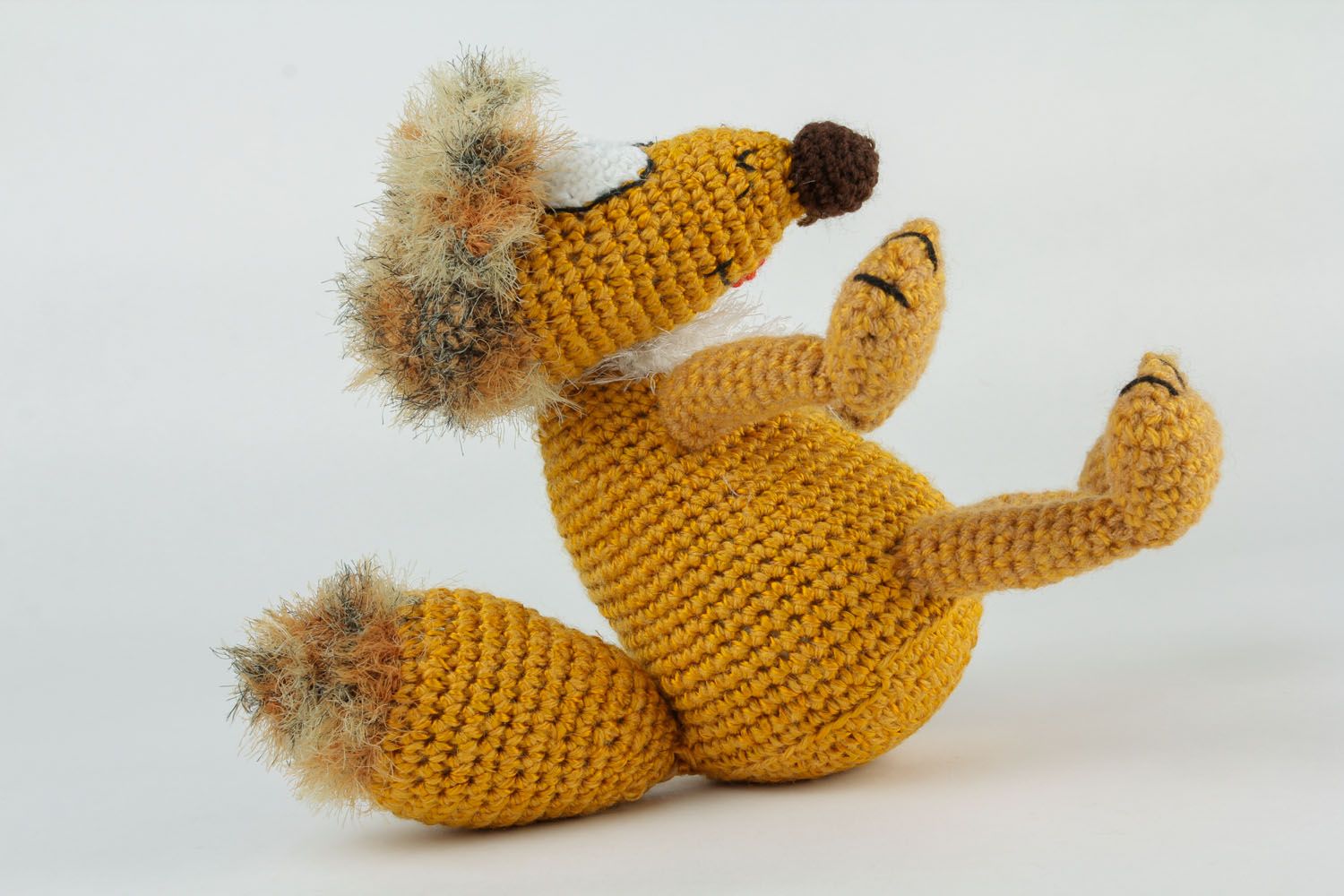 Giocattolo a maglia fatto a mano pupazzo morbido a forma di volpe a uncinetto foto 4