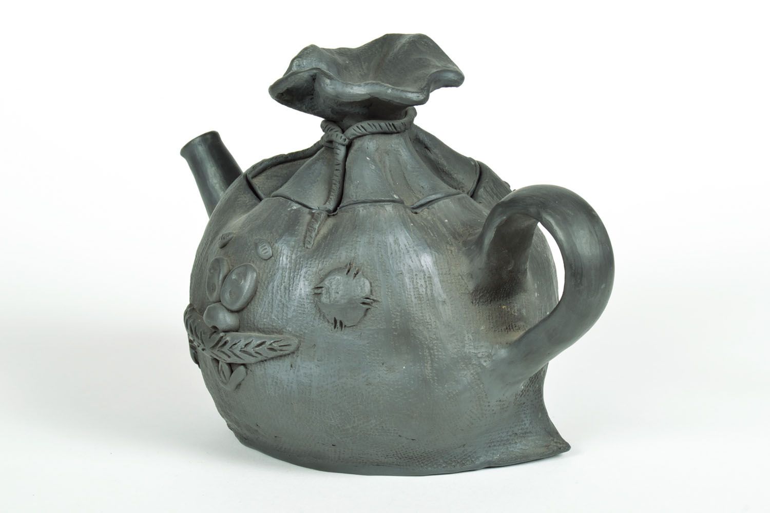 Bule de chá de cerâmica na forma de um saco foto 2