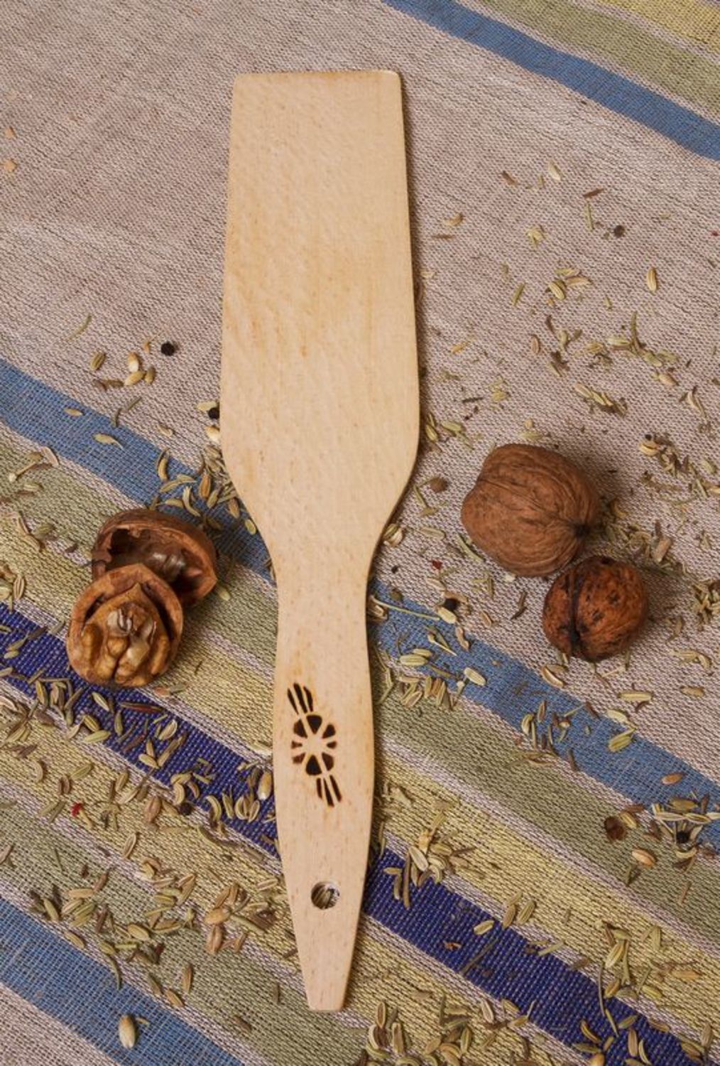 Wooden kitchen spatula with a flower photo 1