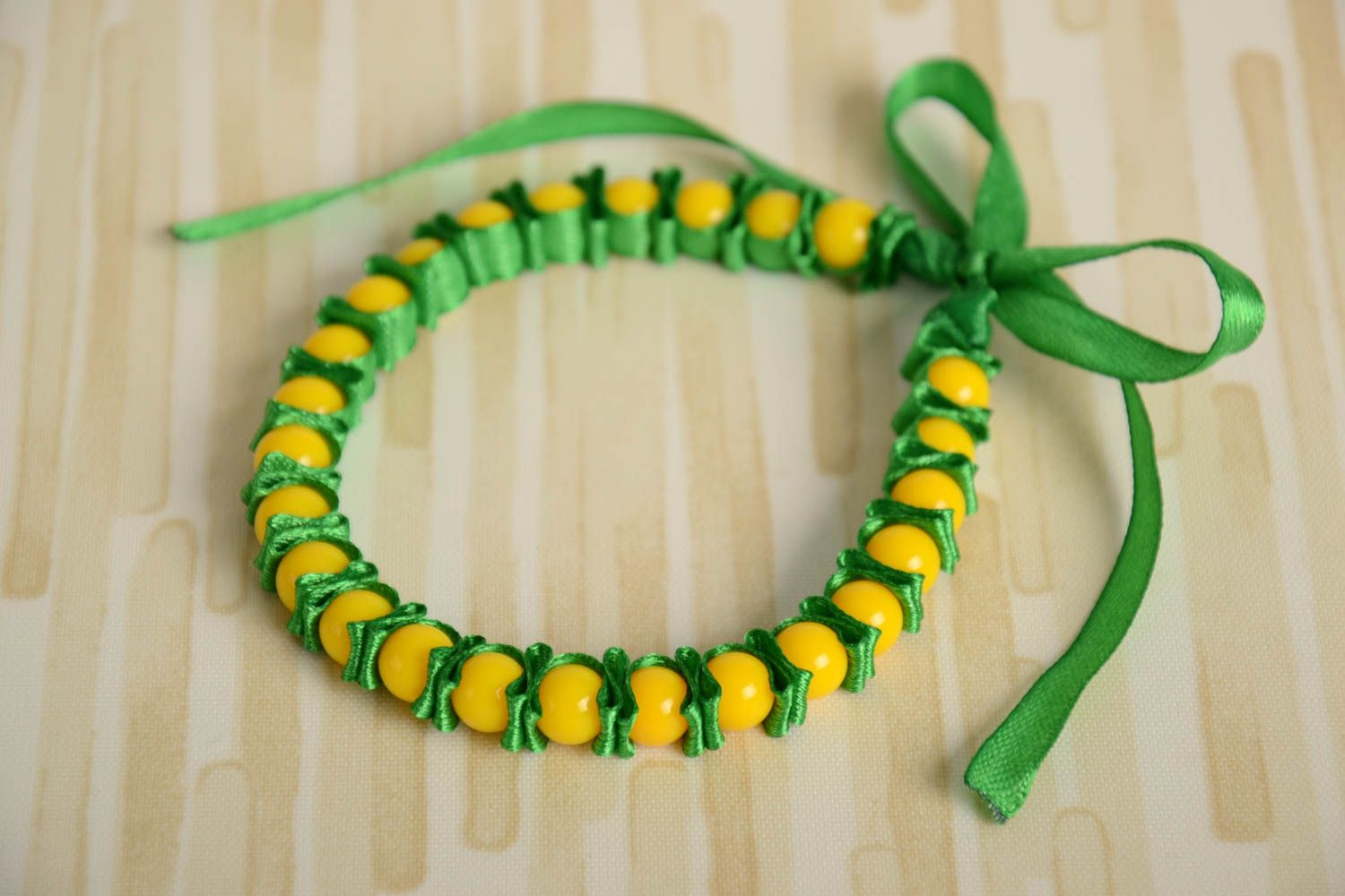 Green woven satin ribbon bracelet with plastic beads Summer handmade photo 1