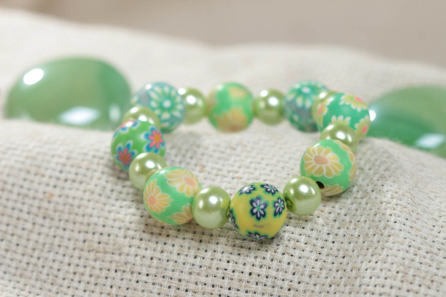 Beautiful children's handmade polymer clay wrist bracelet of green color photo 1