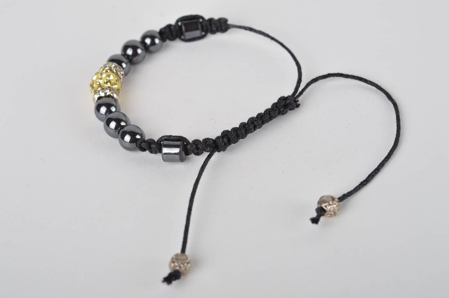Handmade black beads strand bracelet on black cord with golden centerpiece for women photo 5