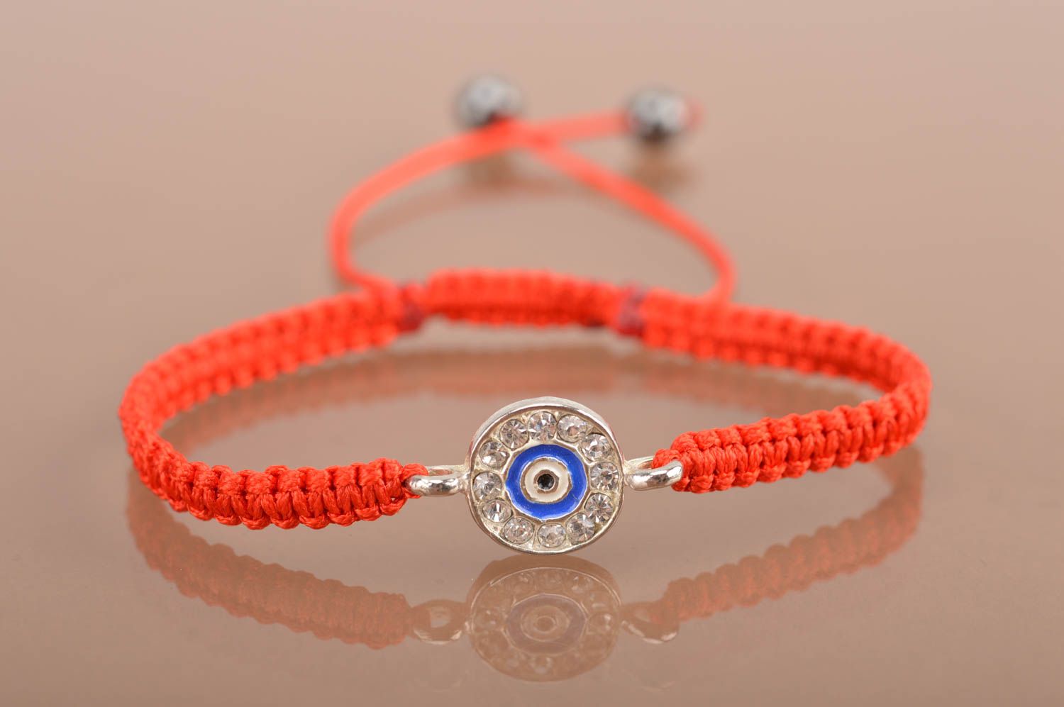 Beautiful handmade friendship bracelet woven of red threads designer jewelry photo 2