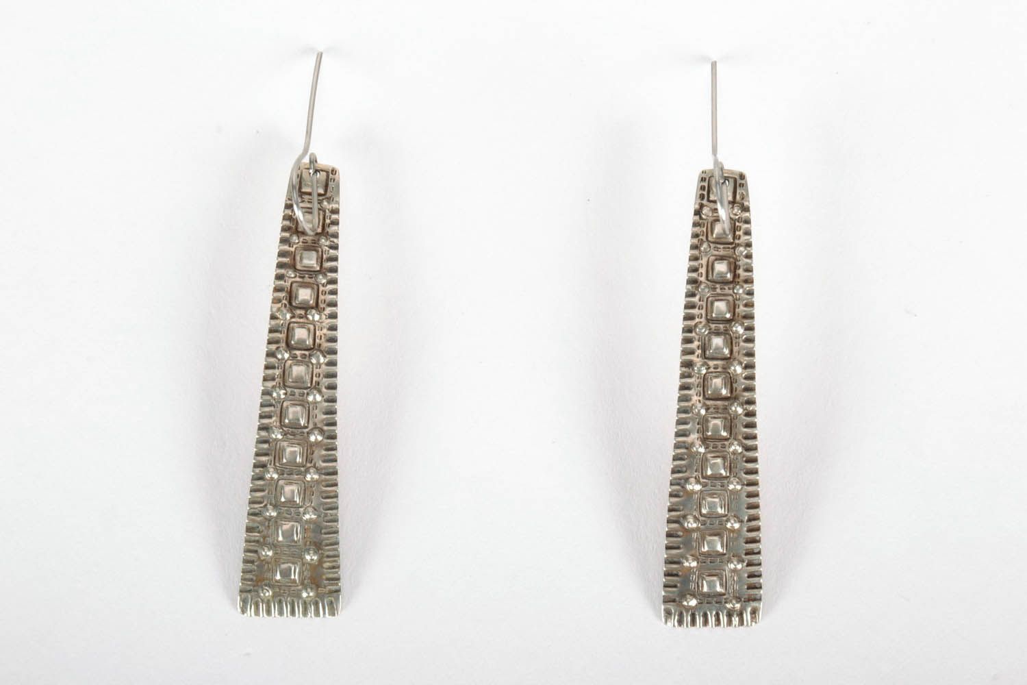 Long metal earrings with ornament photo 2