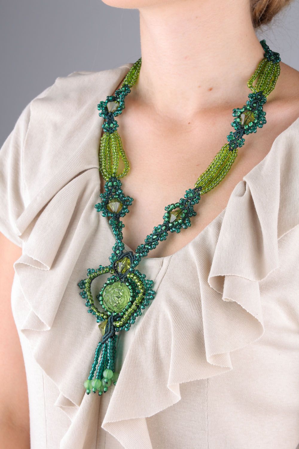 Homemade necklace woven of beads and threads photo 1