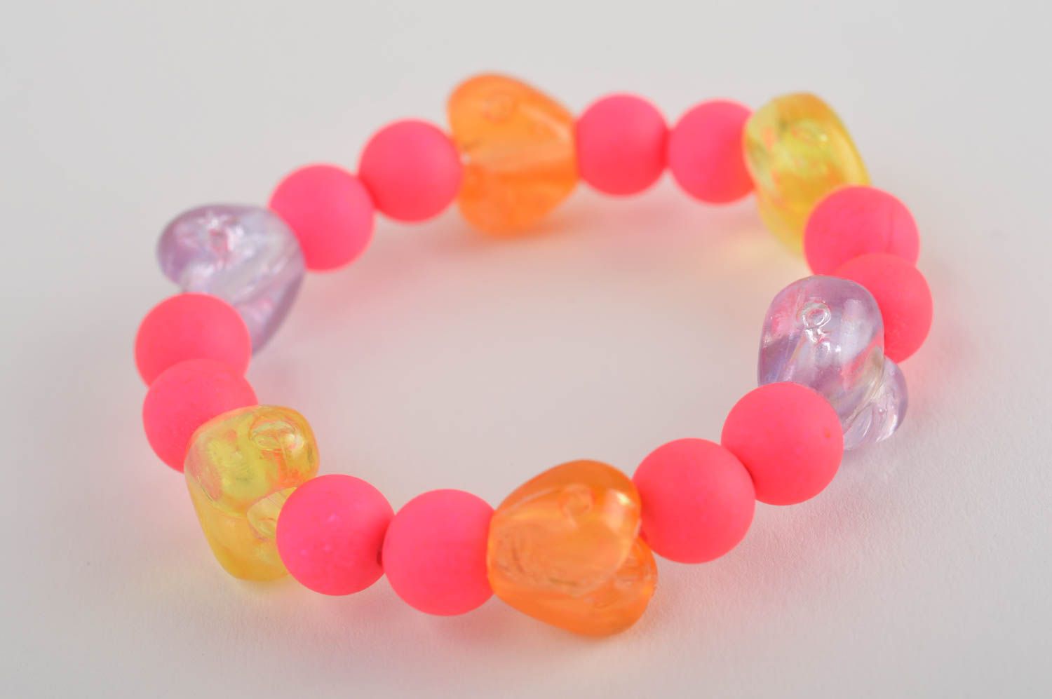 Pink kids beaded bracelet on elastic string with yellow heart-shaped bead photo 2