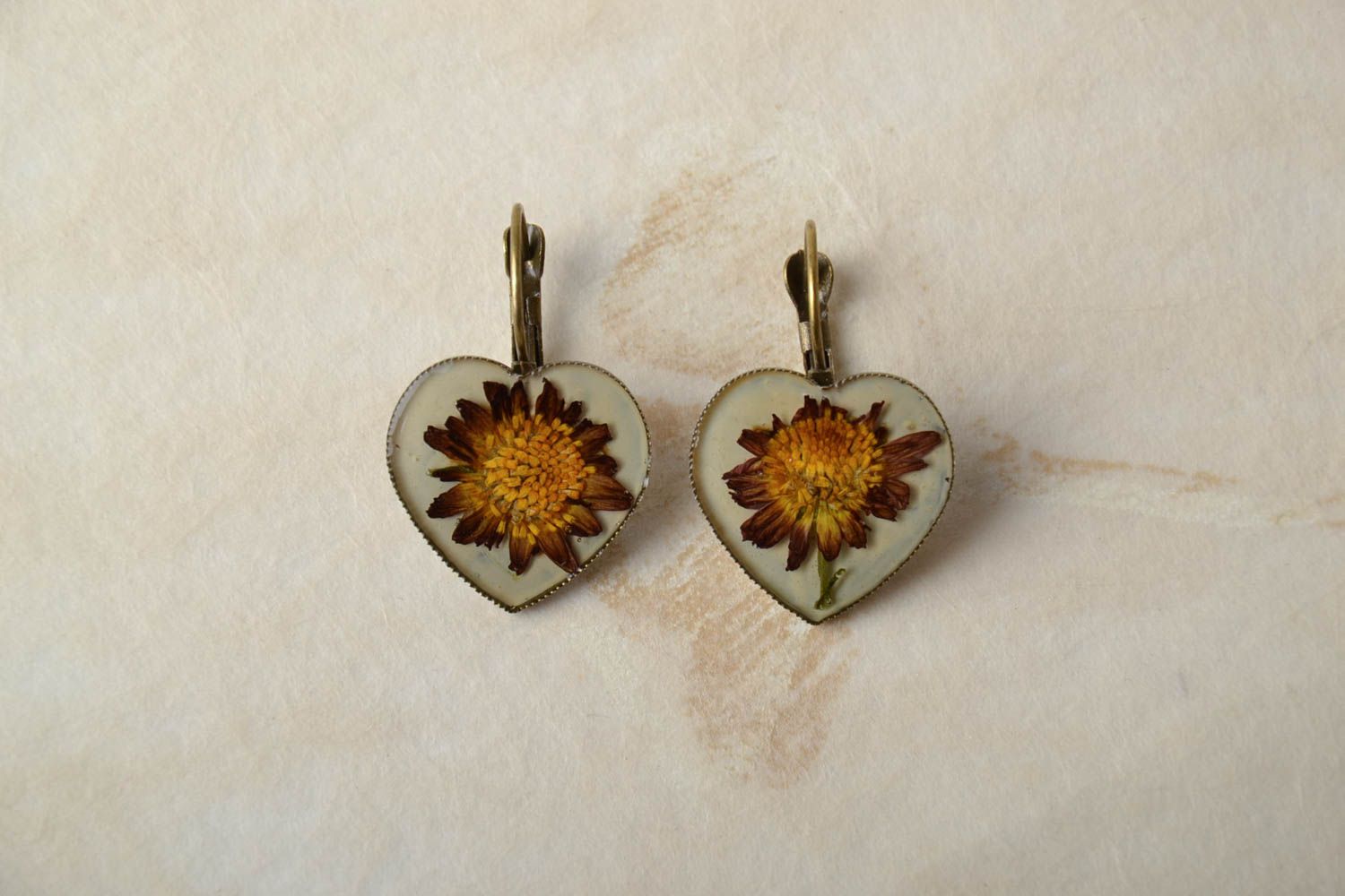 Earrings with natural flowers in epoxy resin Hearts on White Background photo 1