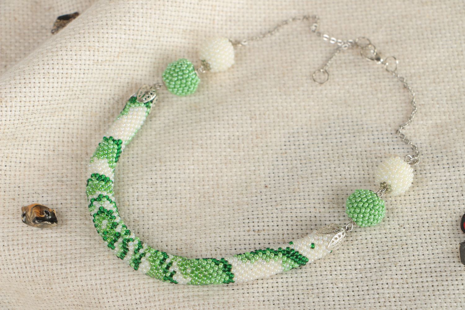 Unusual spring handmade Czech bead cord necklace of white and green colors photo 1
