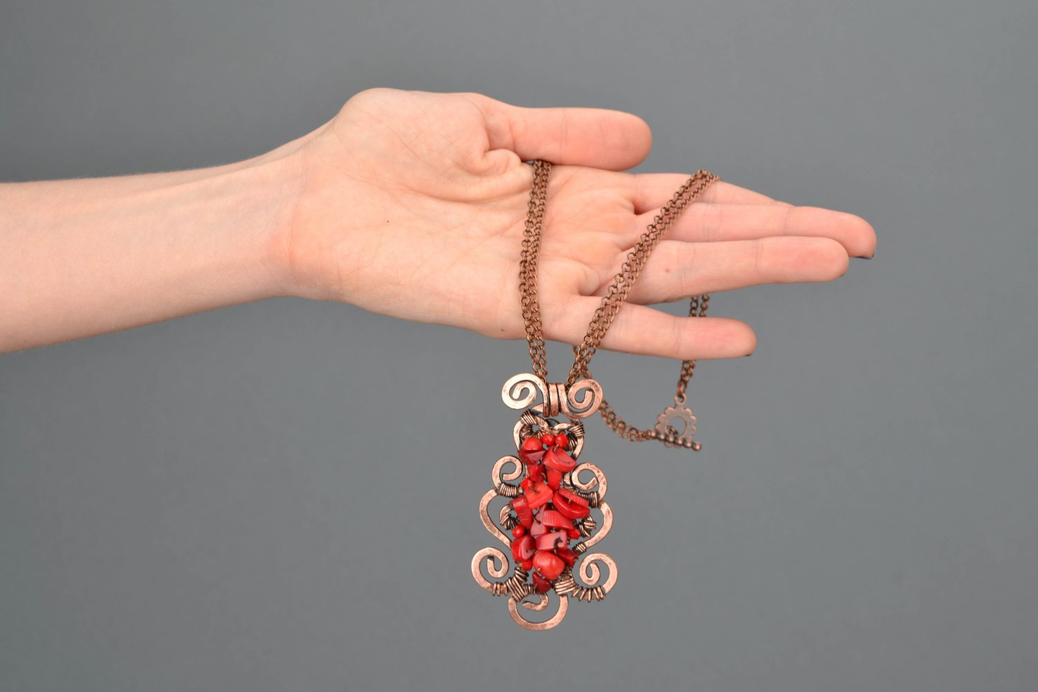 Wire wrap necklace with natural coral photo 2