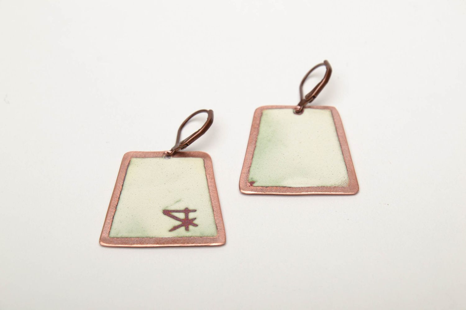 Copper earrings with unusual pattern photo 5