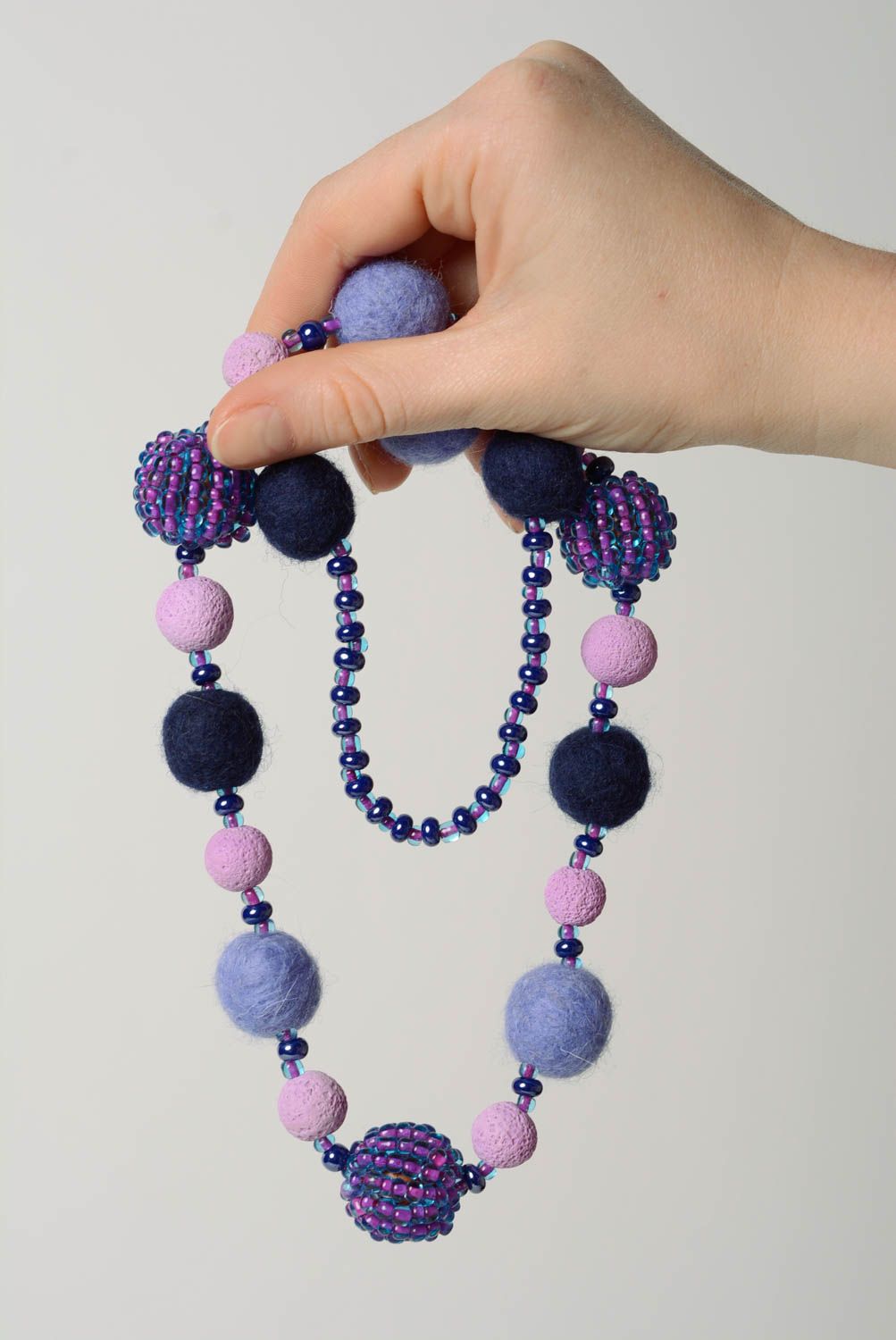 Handmade designer felted wool balls necklace with seed beads in violet color photo 4