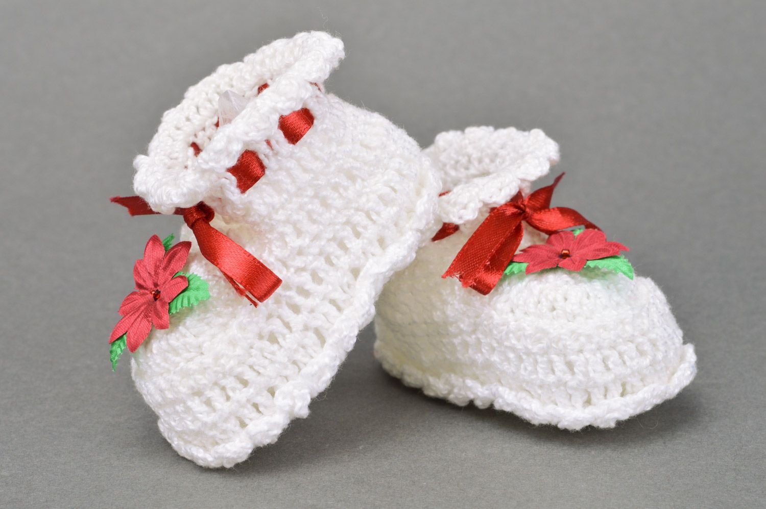 Handmade crocheted white baby booties made of cotton with a flower for a baby girl photo 5
