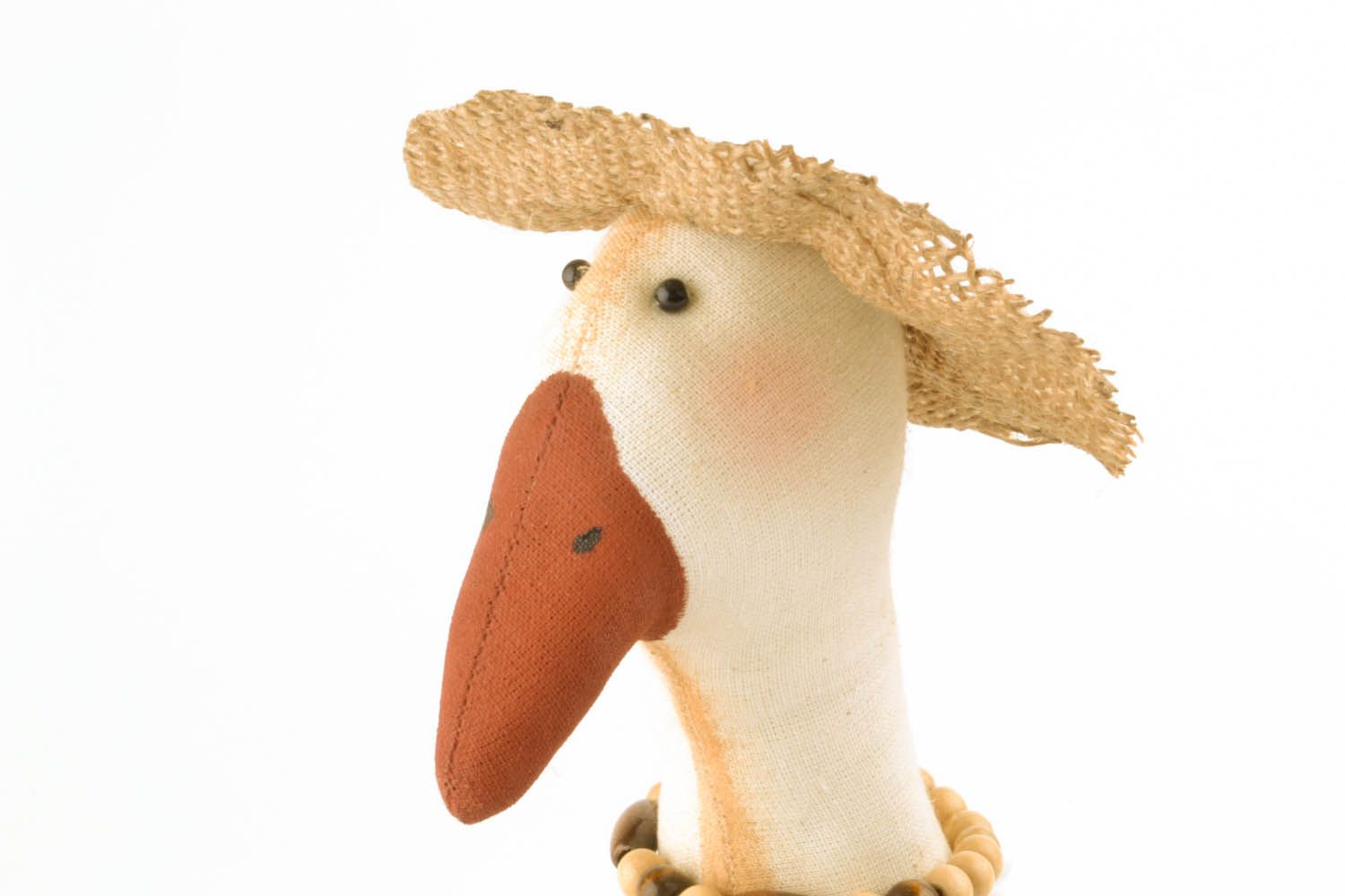 Brinquedo macio artesanal de tecidos naturais Ganso com chapéu foto 2