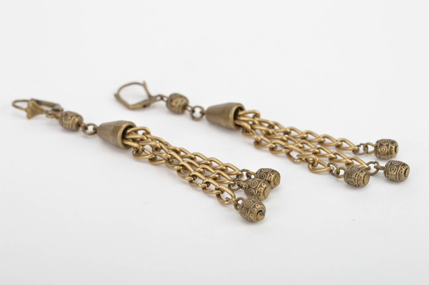 Handmade long dangle earrings with metal chains of bronze color in ethnic style photo 2