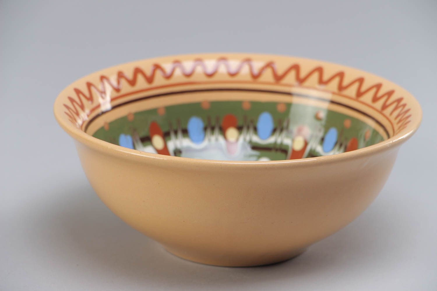 Handmade large red clay bowl with ornament coated with colorful glaze 500 ml photo 2