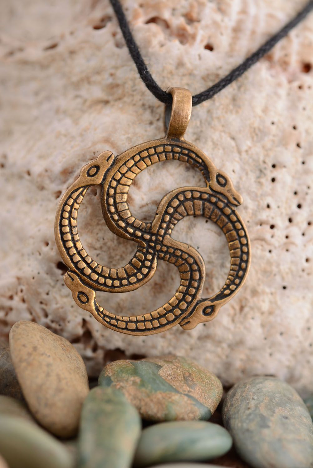 Bronze pendant The Serpent-Kolovrat photo 1