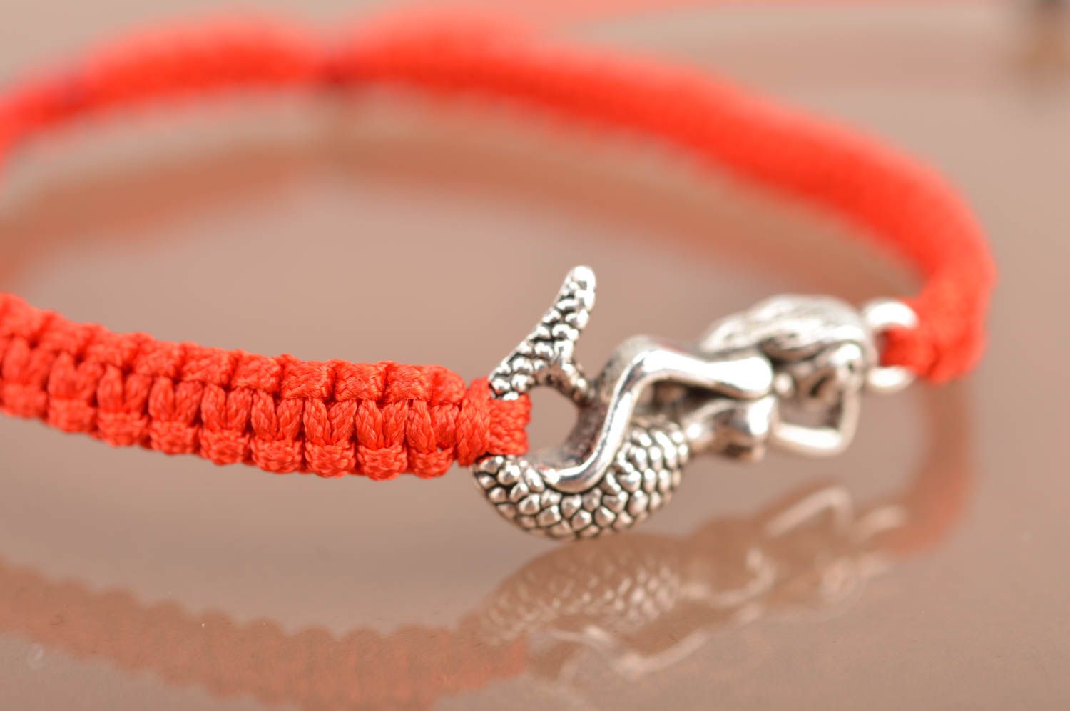 Handmade woven thin cute red bracelet made of silk threads with mermaid photo 4