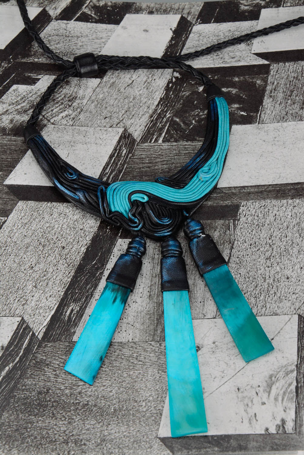 Leather necklace with cow horn photo 2