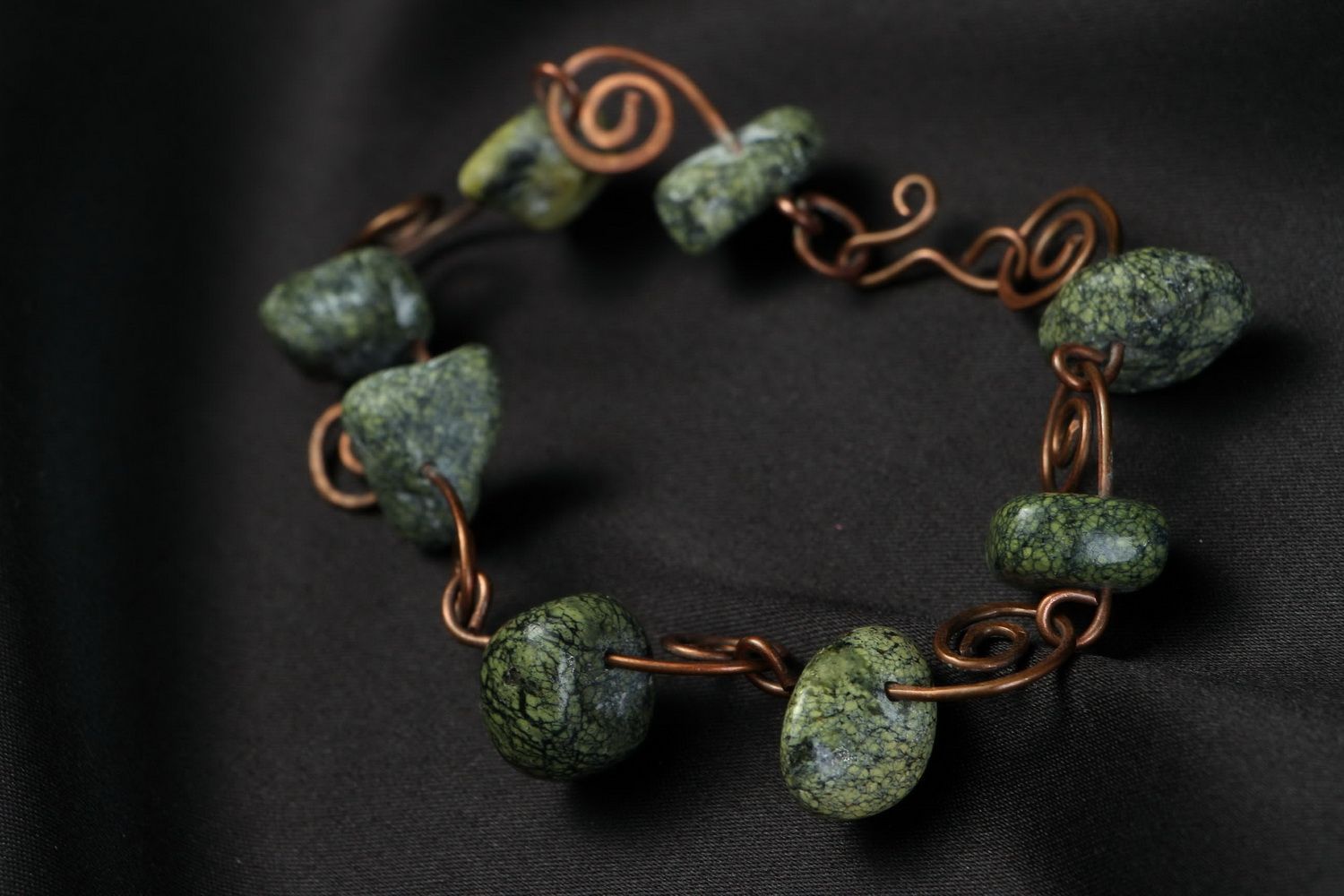 Copper bracelet with a coil stone photo 3