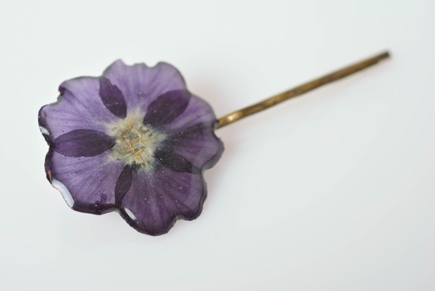 Handmade designer decorative hair pin with violet dried flower in epoxy resin photo 5