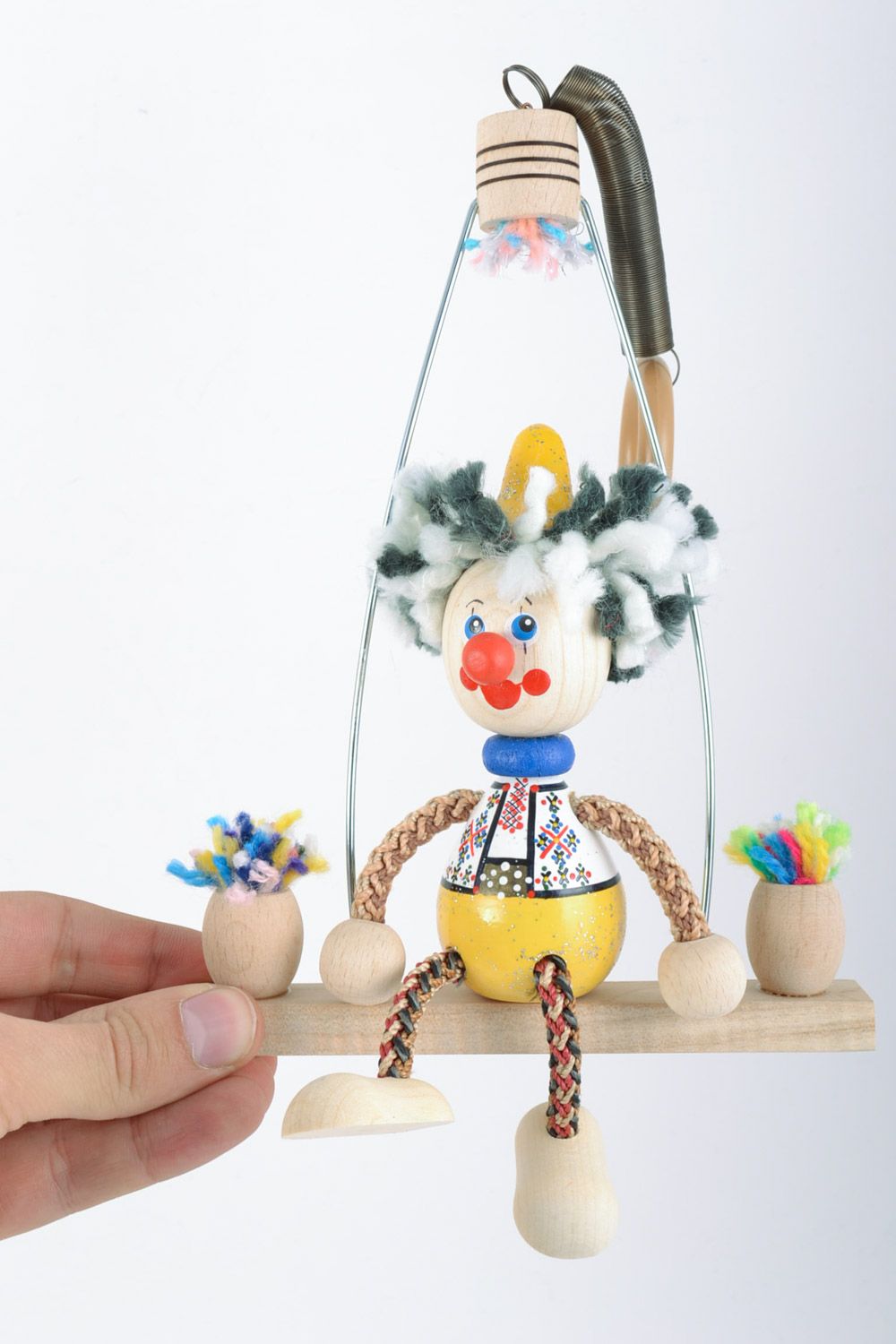 Handmade eco friendly painted varnished wooden toy cute clown on swing for kids photo 2