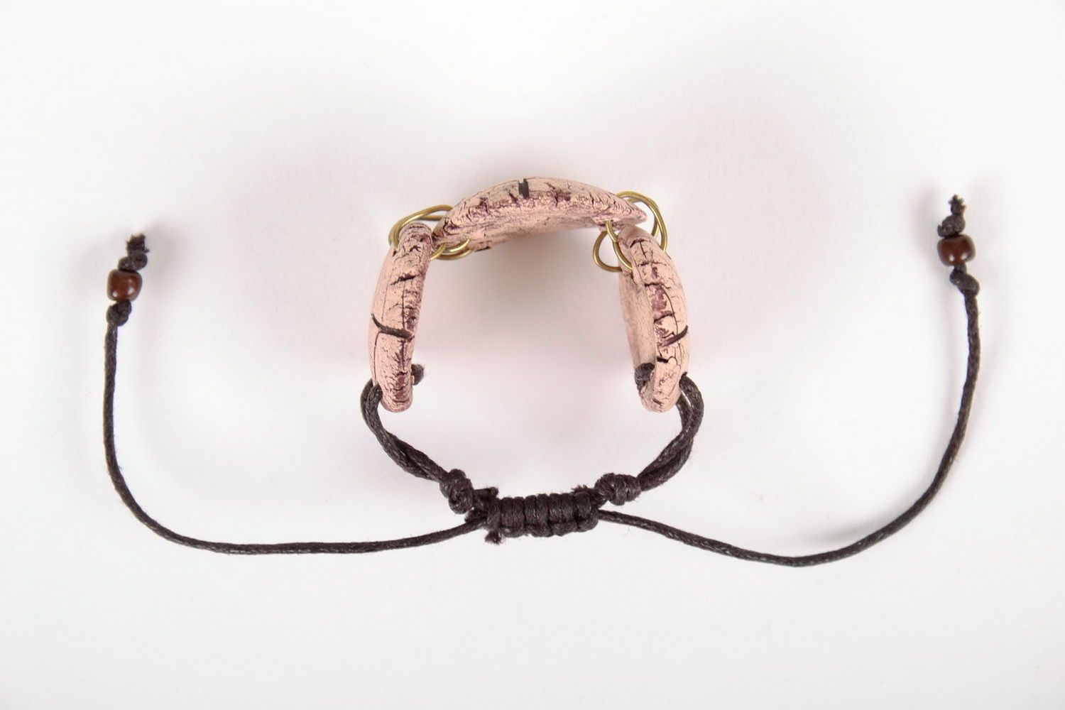 Ceramic bracelet with a cord photo 2