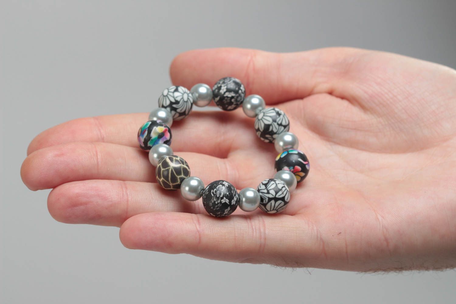 Beautiful gray handmade designer children's plastic bracelet with ceramic pearls photo 5