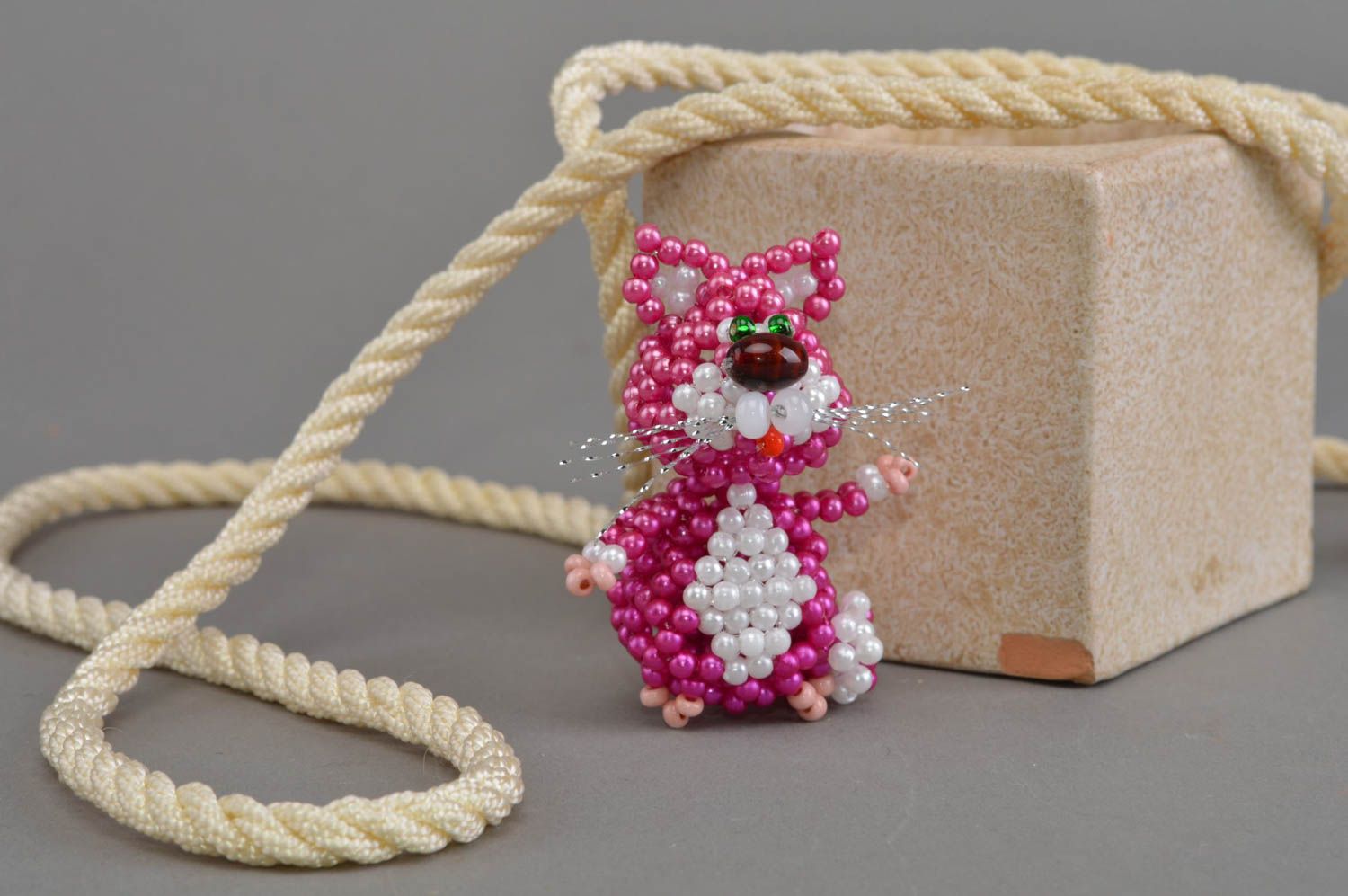 Unusual small handmade designer beaded statuette of cat of crimson color photo 1