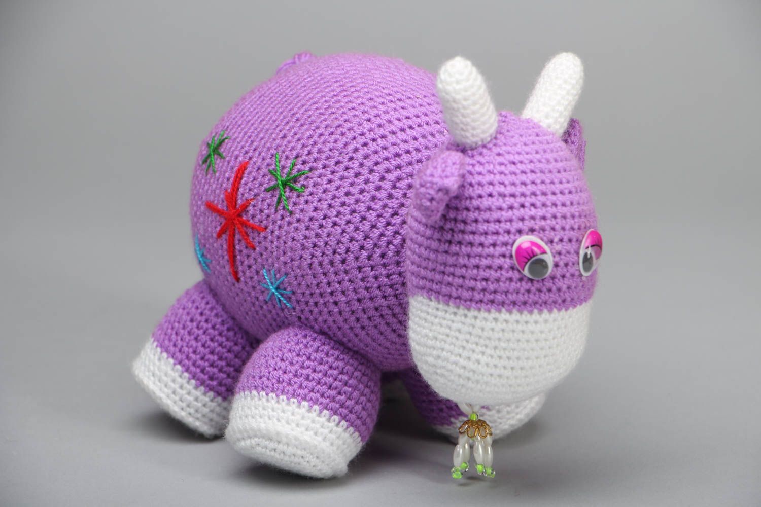 Crochet toy in the shape of purple cow photo 1