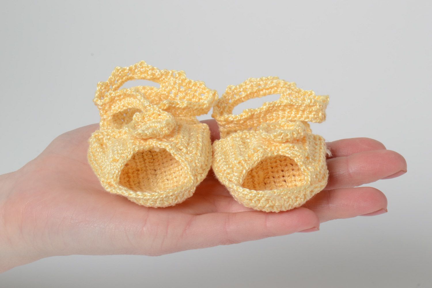 Handmade baby sandals crocheted of cotton threads of yellow color for little girl photo 5