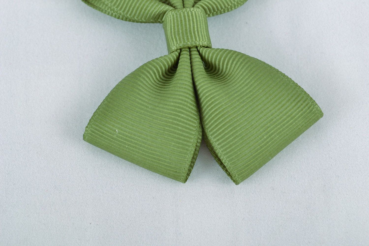 Small handmade rep ribbon bow of green color for creation of accessories photo 4