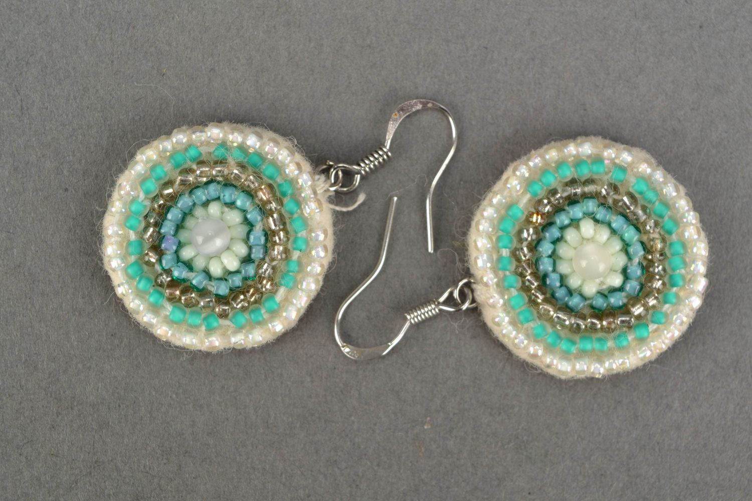 Round embroidered beaded earrings with cat's eye stone photo 3