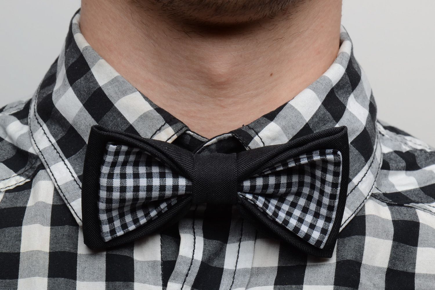 Handmade bow tie sewn of black and checkered costume fabric for men photo 1