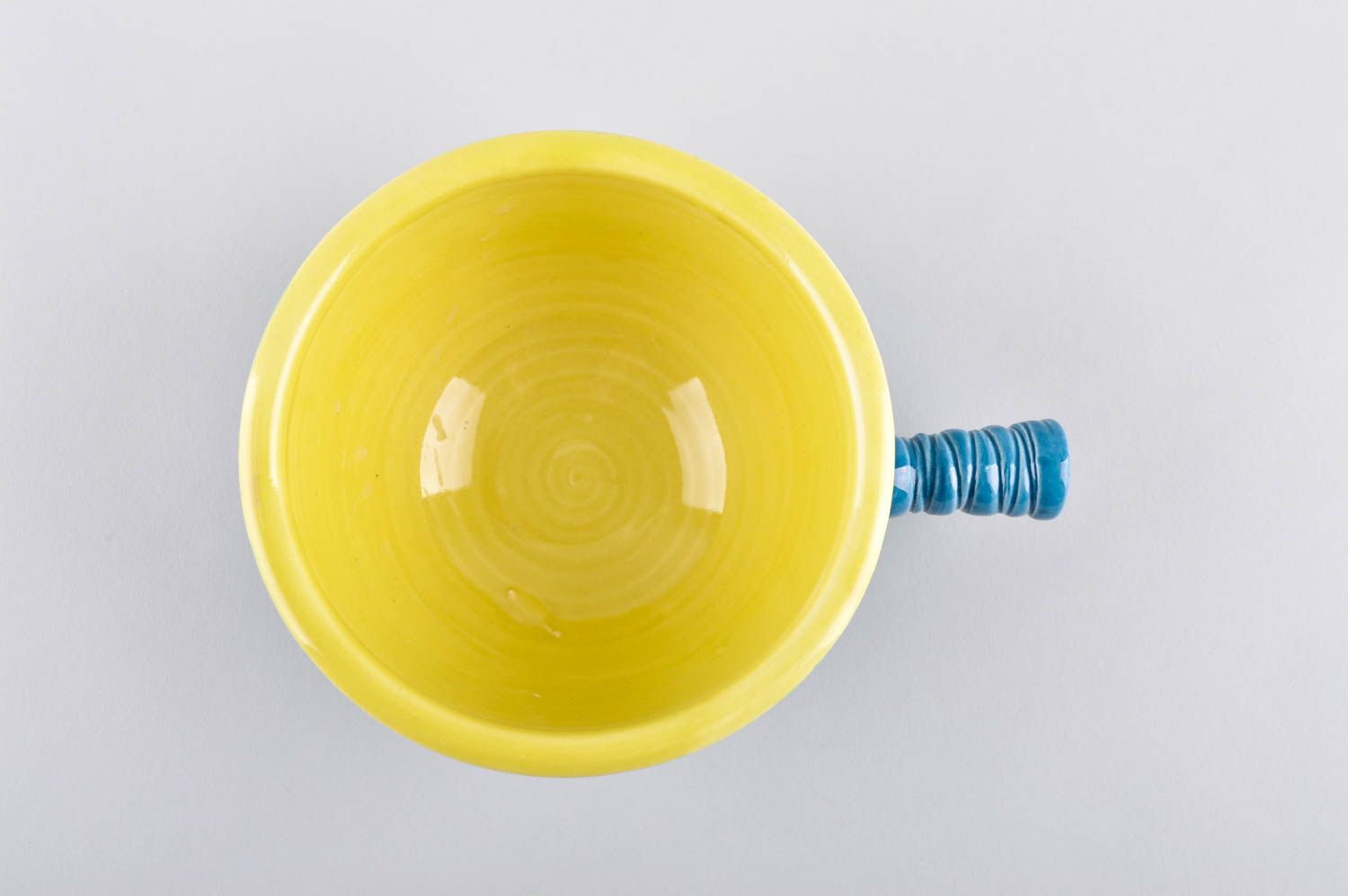 Ceramic blue and yellow color ceramic cup for kids with stick handle photo 4