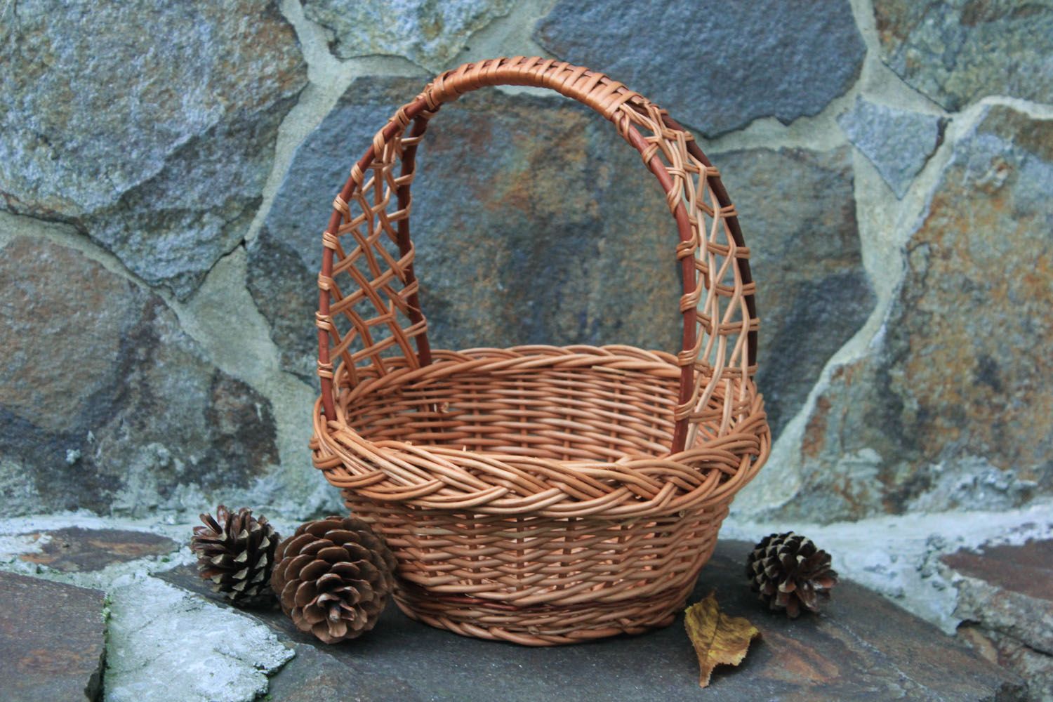 Woven basket with a handle photo 1