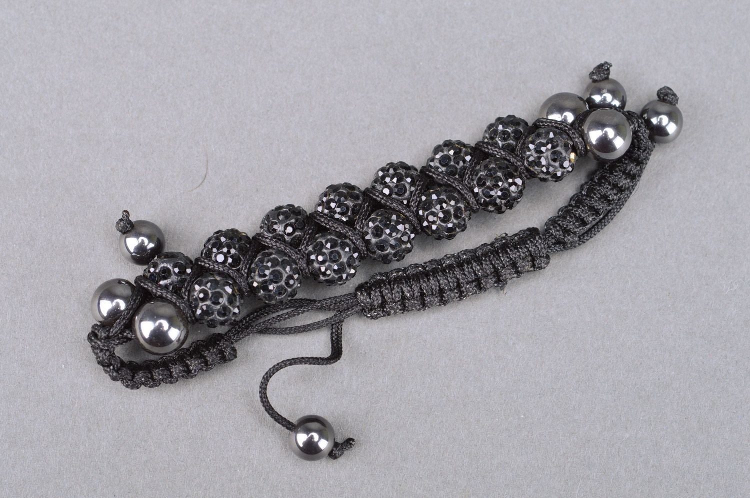 Festive designer handmade woven bead bracelet of black color for women photo 2