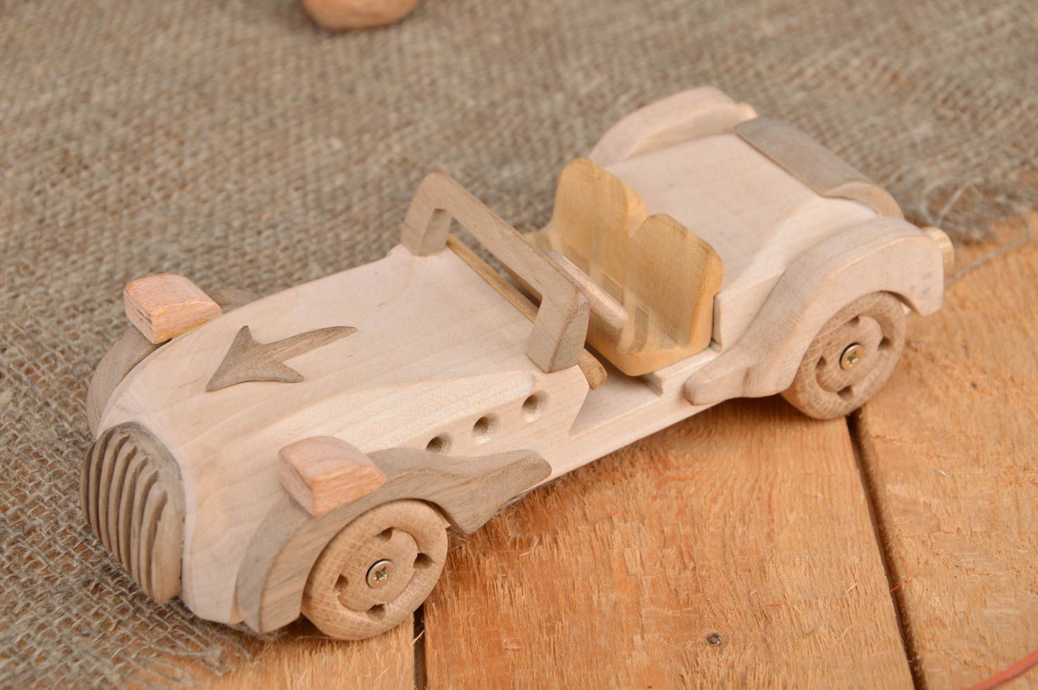 Beautiful light handcrafted children's wooden toy car cabriolet  photo 1