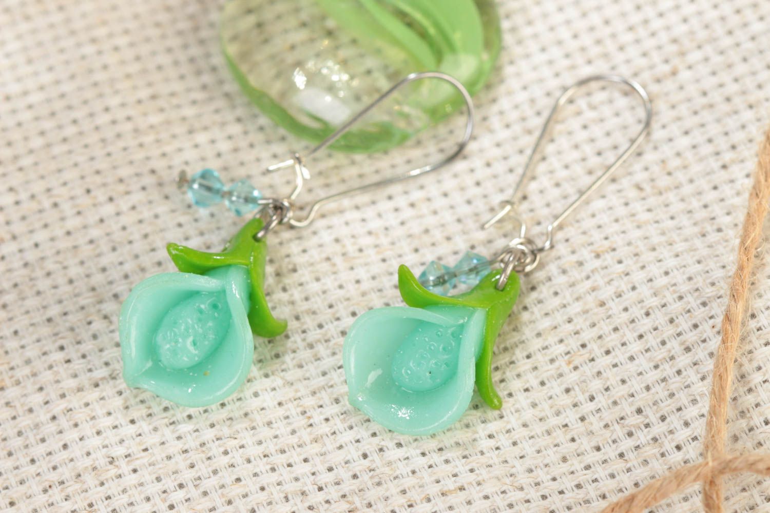 Handmade summer dangling earrings with polymer clay flowers of mint color shade photo 1