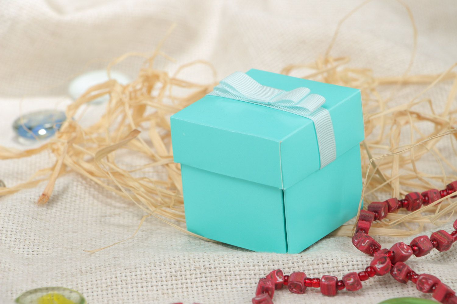 Handmade miniature square carton bonbonniere box of blue color with cute bow photo 1