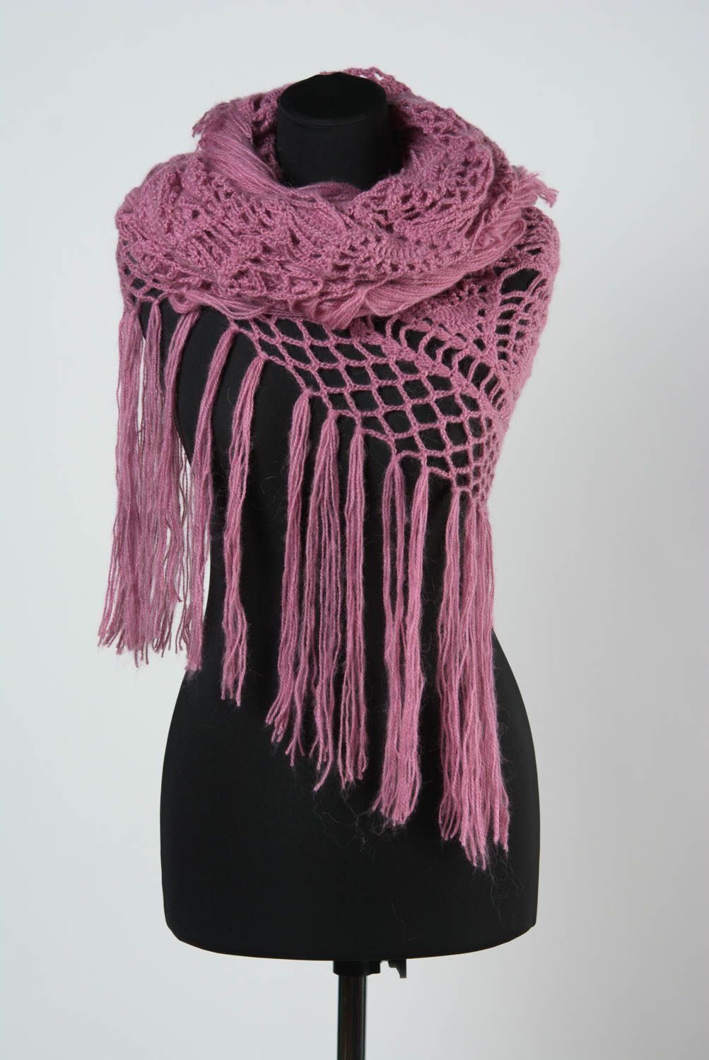 Handmade warm lace shawl knitted of woolen threads of pink color with fringe photo 1