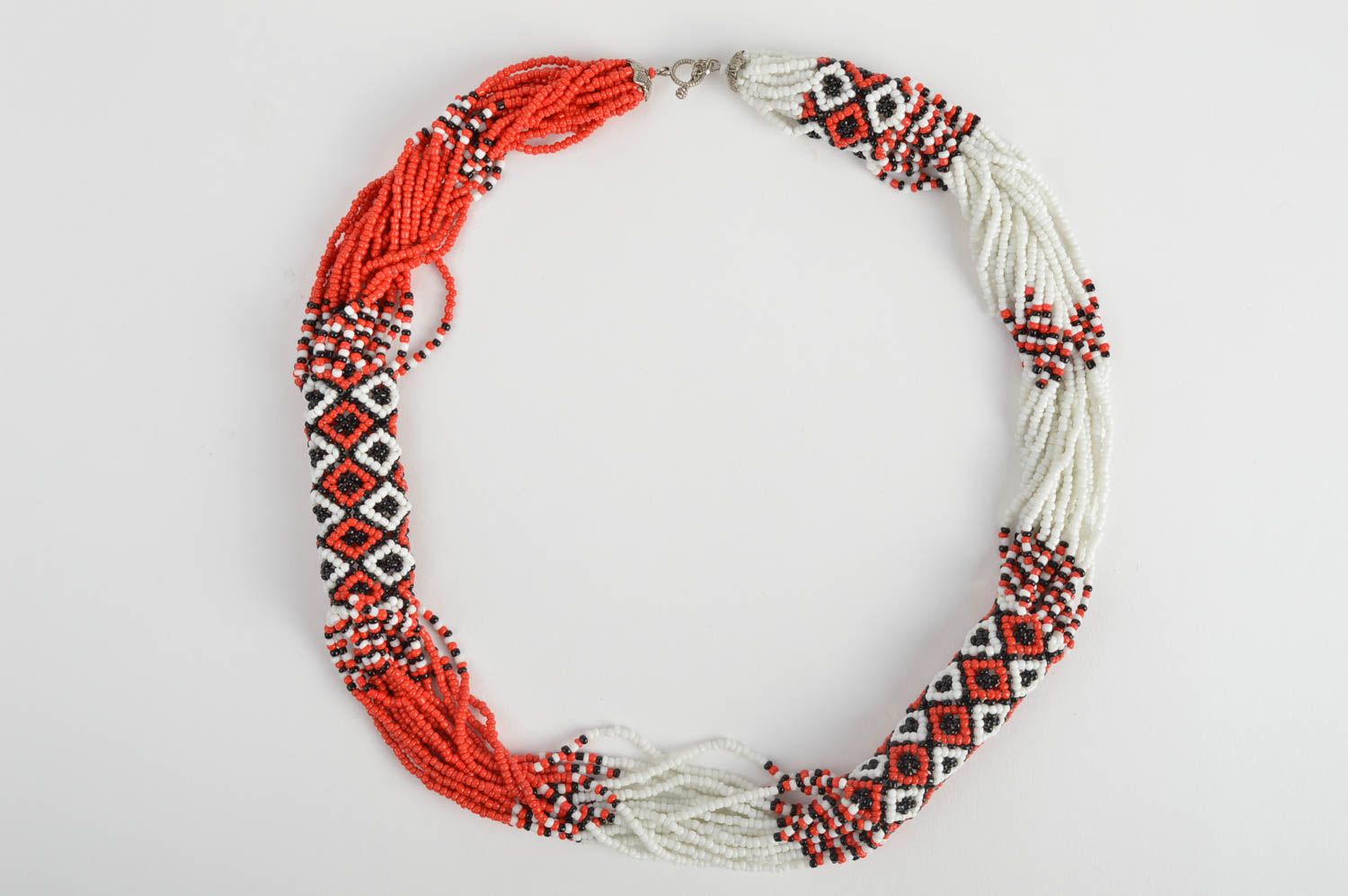 Handmade massive women's red and white beaded cord necklace with ethnic ornament photo 2