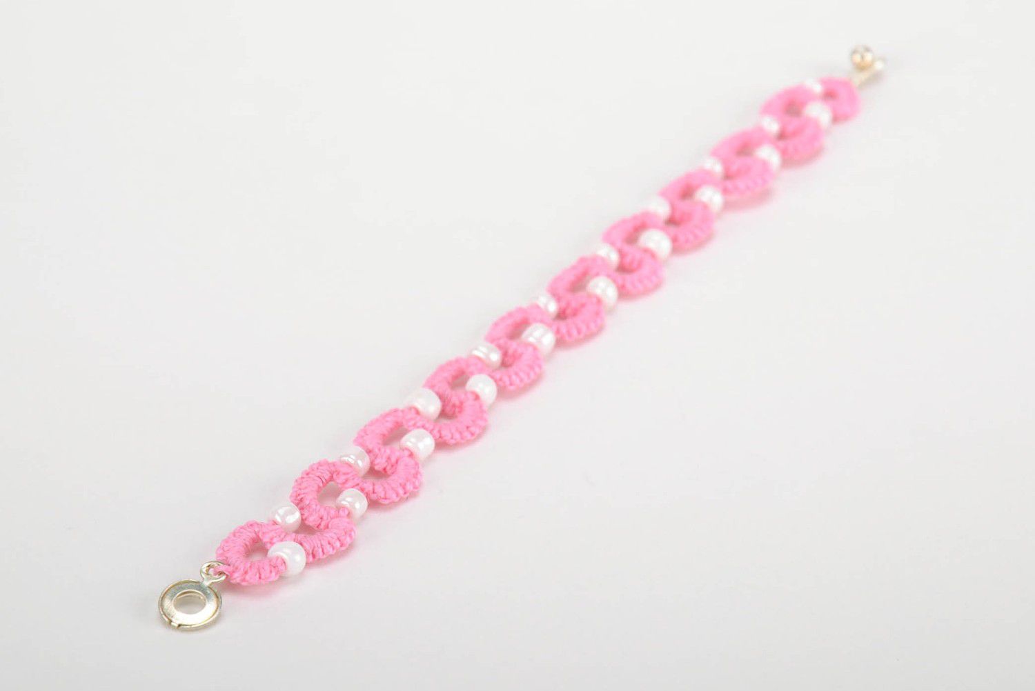 Bracelet braided from cotton threads white and pink photo 2