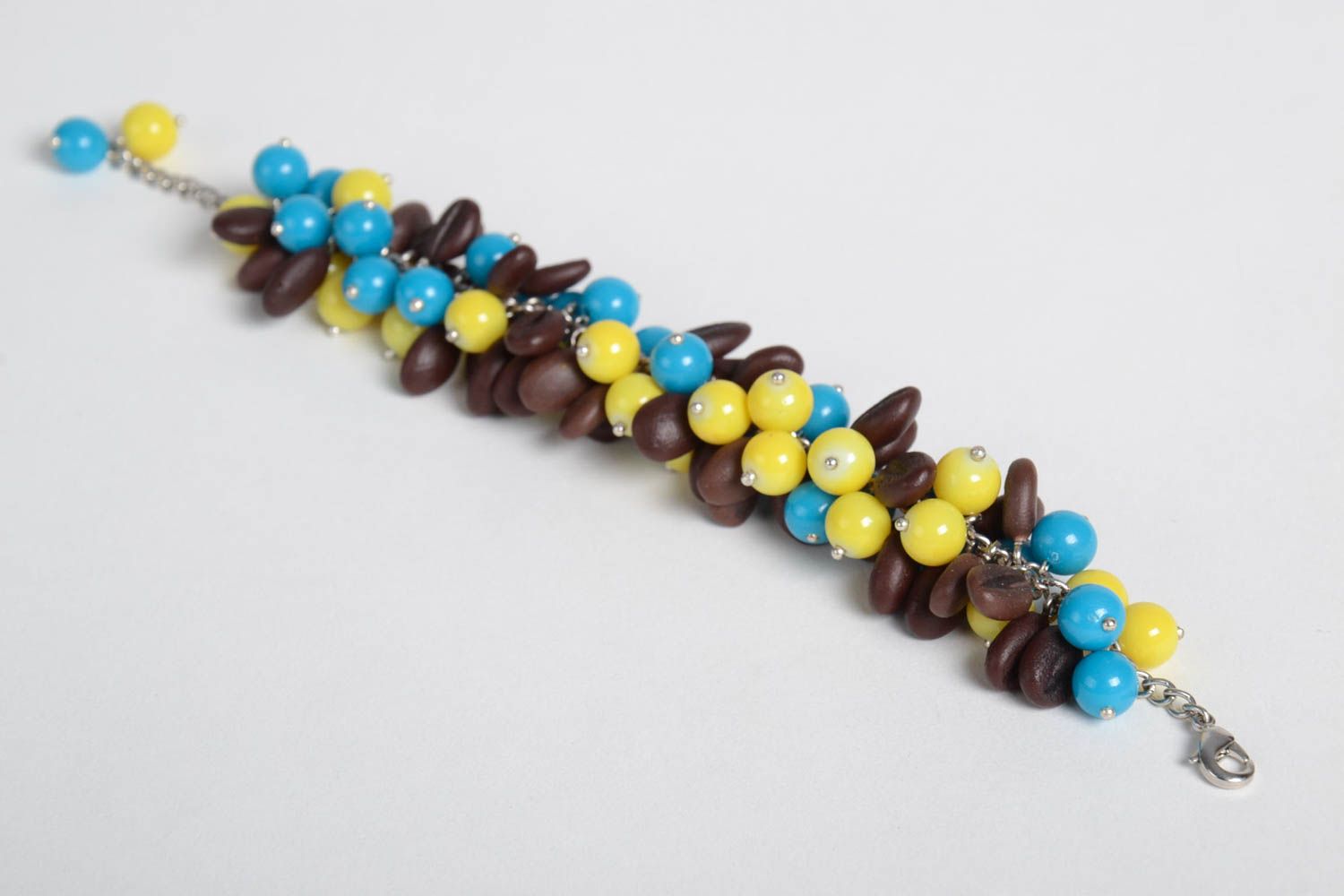 Multiple blue, yellow, brown beads charm bracelet  photo 6