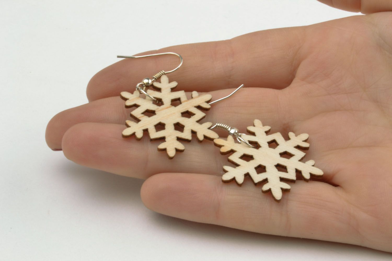 Wooden snowflakes earrings photo 2