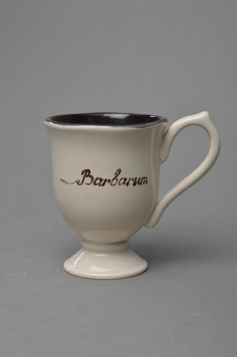 Handmade elegant porcelain glazed white and black coffee cup with barberry image photo 2