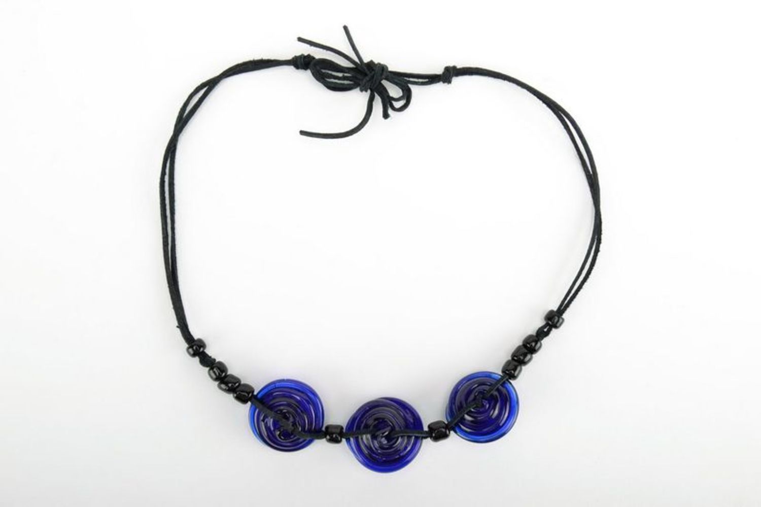 Dark blue tough glass necklace with leather cord photo 2