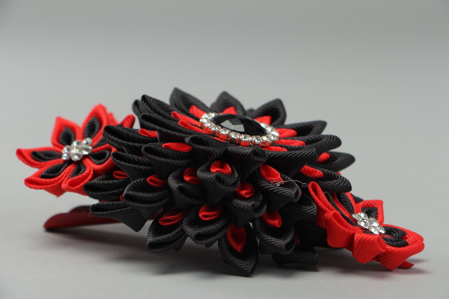 Black and red handmade hair clip with kanzashi flower created of rep ribbons photo 2