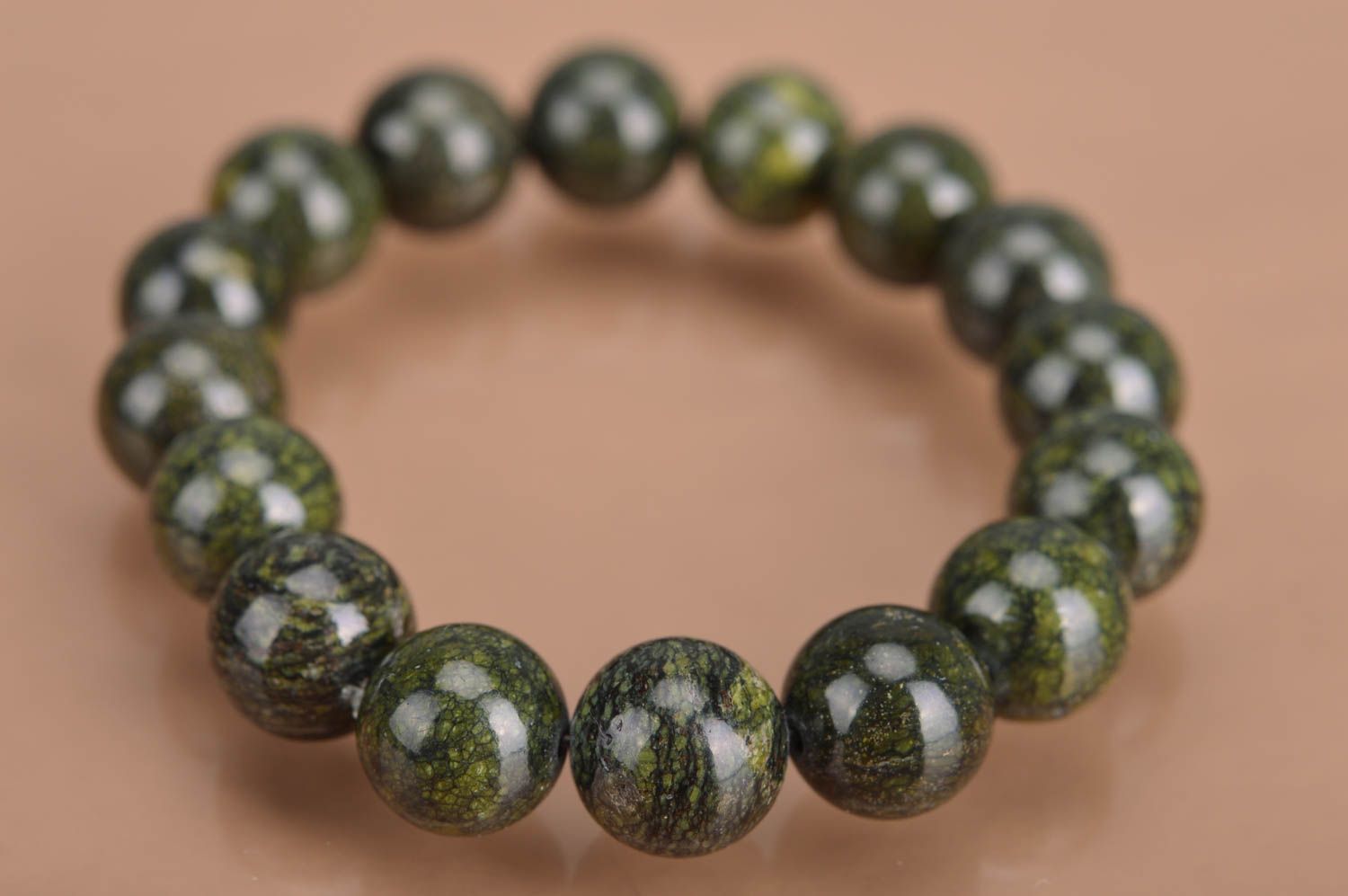 Designer handmade wrist women's bracelet with beads of moss green color photo 2