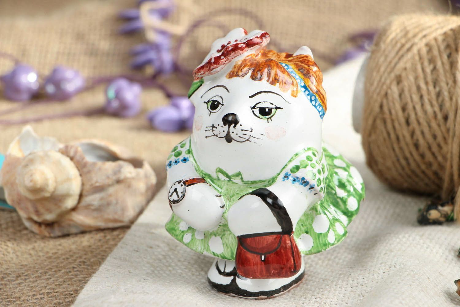 Keramik Statuette Katze mit Tasche foto 5