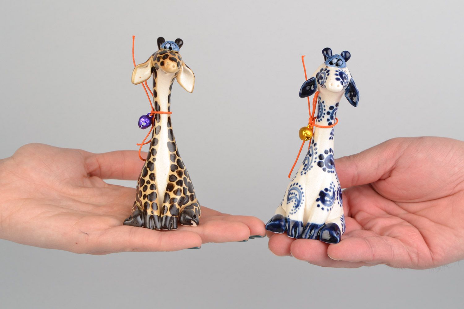 Set of 2 handmade designer ceramic figurines of giraffes painted with glaze photo 2